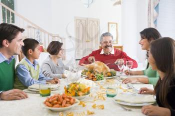 Royalty Free Photo of a Family Having Christmas Dinner