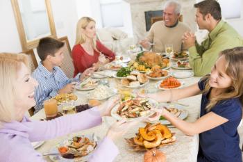 Royalty Free Photo of a Family Having Christmas Dinner