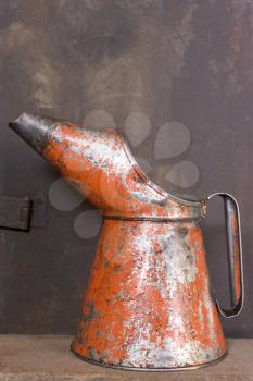 Royalty Free Photo of a Rusty Oil Can