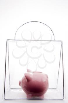 Royalty Free Photo of a Piggy Bank in a Bag