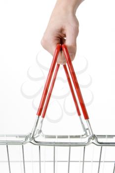 Royalty Free Photo of a Hand With a Shopping Basket