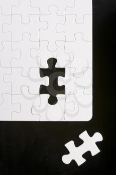Royalty Free Photo of a Puzzle With the Pice Removed