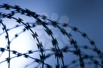 Royalty Free Photo of a Barbed Wire Fence