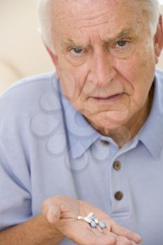 Royalty Free Photo of a Man Holding Drugs