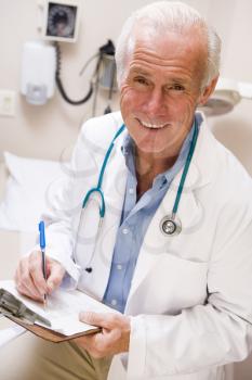 Royalty Free Photo of a Doctor With a Clipboard