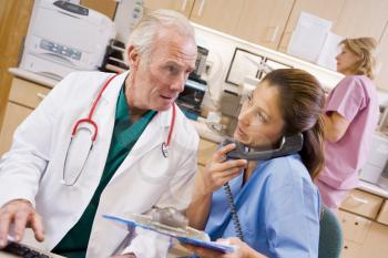 Royalty Free Photo of a Doctor and Nurse at the Hospital