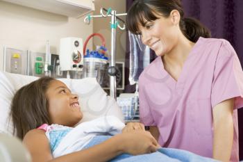 Royalty Free Photo of a Nurse Talking to a Patient