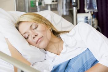 Royalty Free Photo of a Woman Sleeping in the Hospital