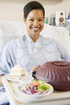 Royalty Free Photo of a Patient With Hospital Food