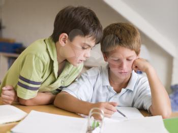 Royalty Free Photo of Boys Doing Homework