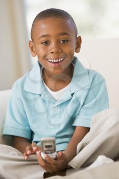 Royalty Free Photo of a Boy Sending a Text Message