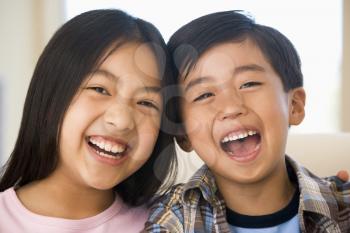 Royalty Free Photo of a Brother and Sister Laughing