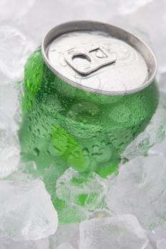 Royalty Free Photo of a Soft Drink Can on Ice