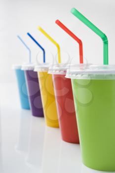 Royalty Free Photo of Plastic Cups With Straws