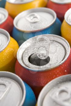 Royalty Free Photo of Soda Cans With One Opened