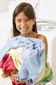 Royalty Free Photo of a Girl With Laundry