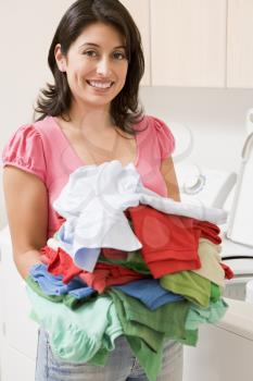 Royalty Free Photo of a Woman Doing Laundry
