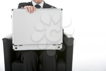 Royalty Free Photo of a Businessman With an Open Briefcase