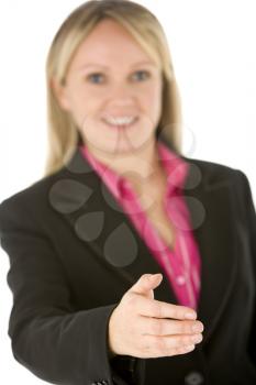 Royalty Free Photo of a Businesswoman Holding Out Her Hand