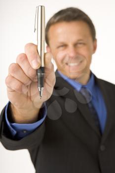 Royalty Free Photo of a Guy With a Pen