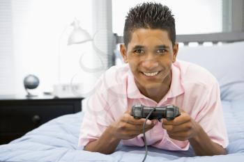 Royalty Free Photo of a Boy Playing Video Games