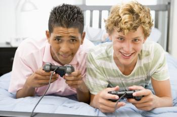 Royalty Free Photo of Boys Playing Video Games