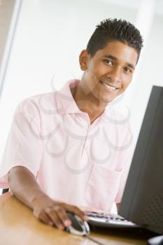 Royalty Free Photo of a Boy With a Computer