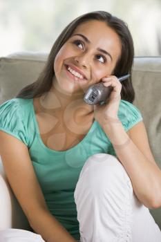 Royalty Free Photo of a Girl Talking on a Telephone