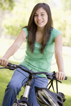 Royalty Free Photo of a Teenager on a Bike