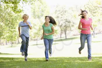 Royalty Free Photo of Teens Running