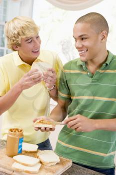 Royalty Free Photo of Teens Making Sandwiches