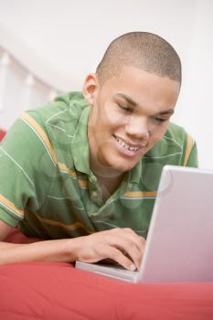 Royalty Free Photo of a Boy With a Laptop
