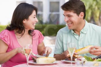 Royalty Free Photo of a Couple Dining Outside