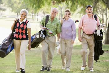 Royalty Free Photo of Four Friends Golfing