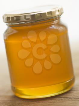 Royalty Free Photo of a Jar of Honey