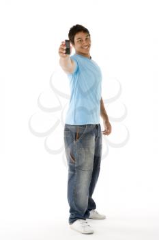Royalty Free Photo of a Teenage Boy With a Cellphone