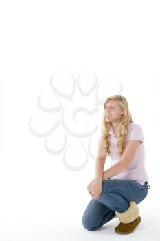 Royalty Free Photo of a Girl Kneeling