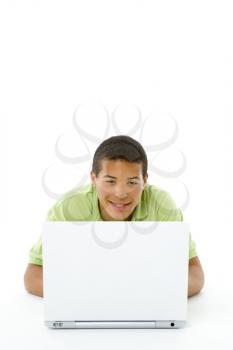 Royalty Free Photo of a Teenager With His Laptop