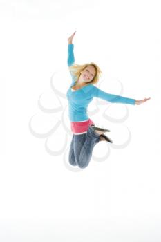 Royalty Free Photo of a Teenager Jumping