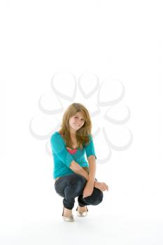 Royalty Free Photo of a Girl Crouching