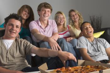 Royalty Free Photo of Teens Having Pizza