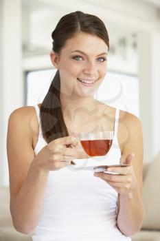 Royalty Free Photo of a Girl Drinking Herbal Tea