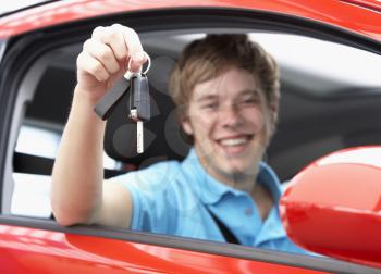 Royalty Free Photo of a Boy Holding Car Keys
