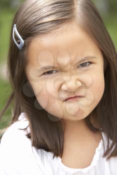 Royalty Free Photo of a Frowning Little Girl