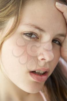 Royalty Free Photo of a Girl Looking Frustrated