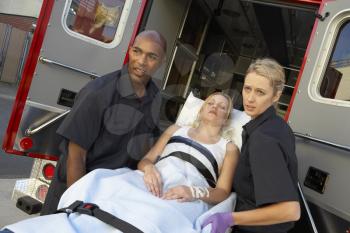Royalty Free Photo of Paramedics Unloading a Patient