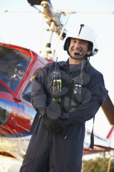 Royalty Free Photo of a Paramedic in Front of an Air Ambulance