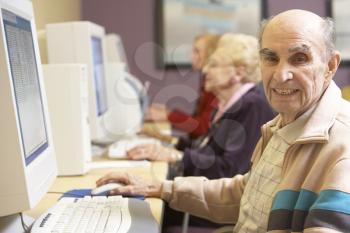 Royalty Free Photo of Seniors Using Computers