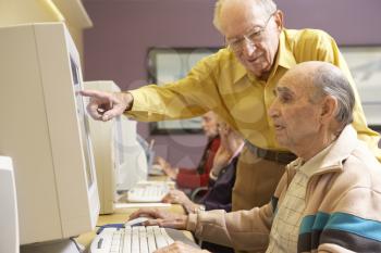 Royalty Free Photo of Group of Seniors on Computers