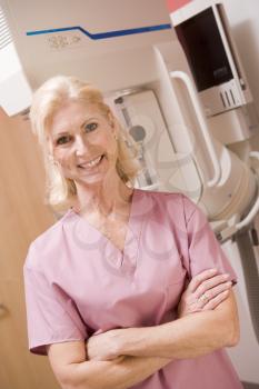 Royalty Free Photo of a Woman With a Mammogram Machine